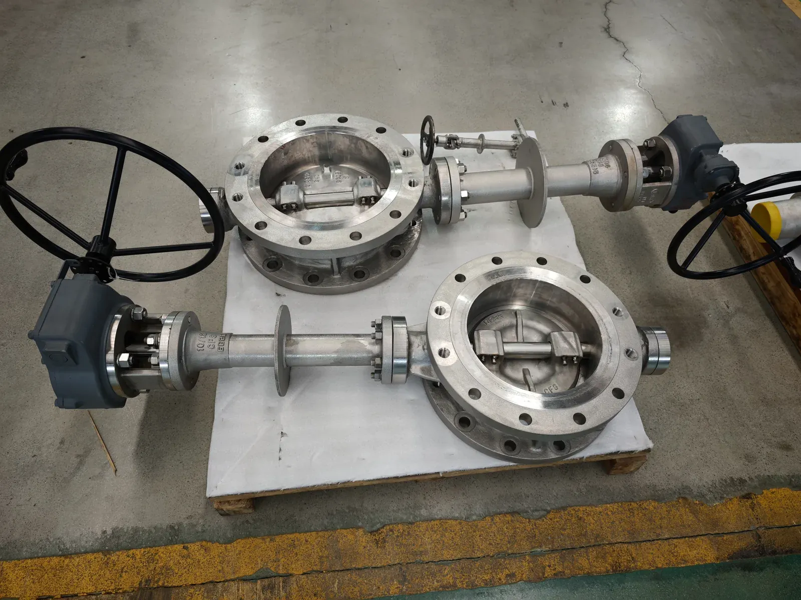 Triple-offset cryogenic butterfly valve with maintenance port, factory floor