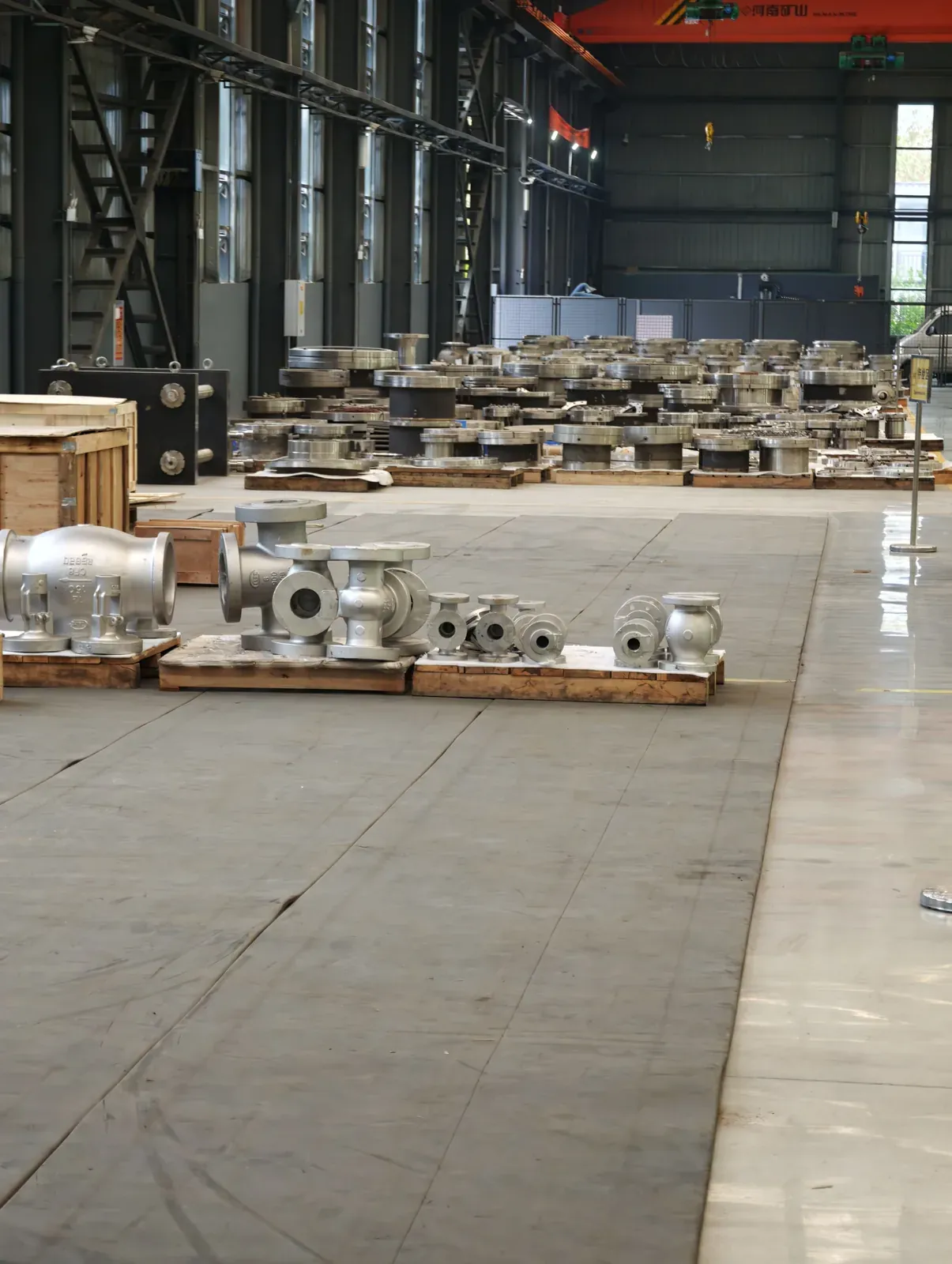Valve castings and semi-finished bodies staged on pallets